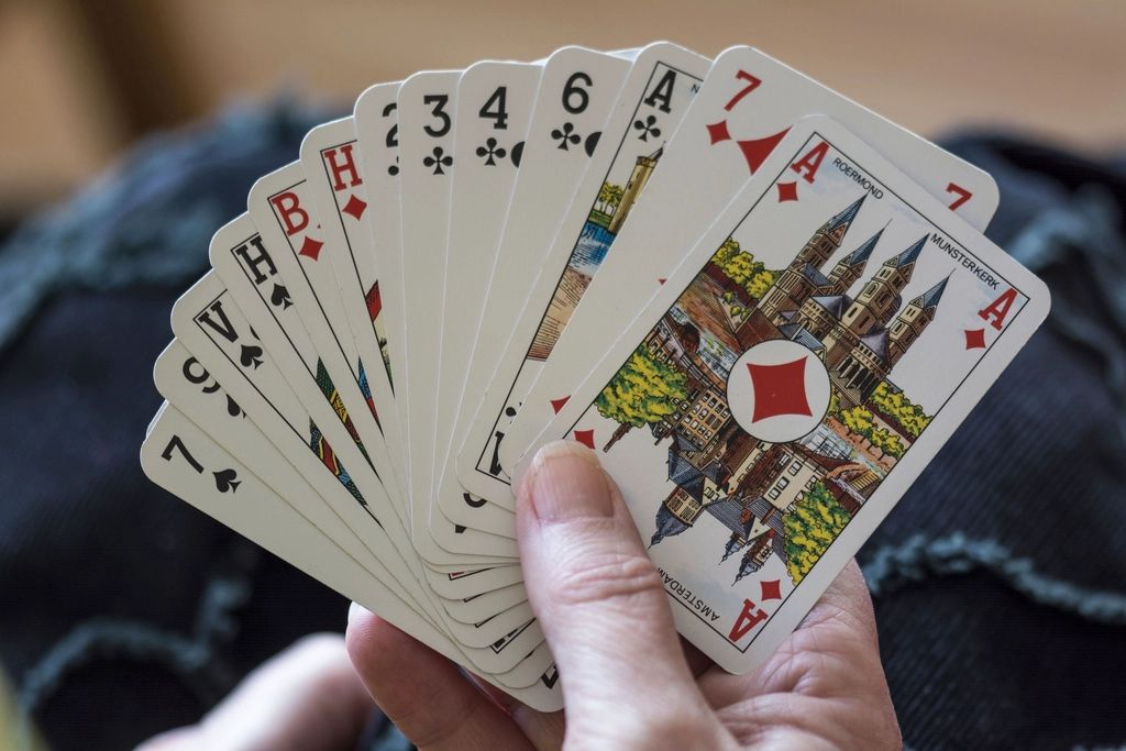 Gaming chips and cards on the table felt